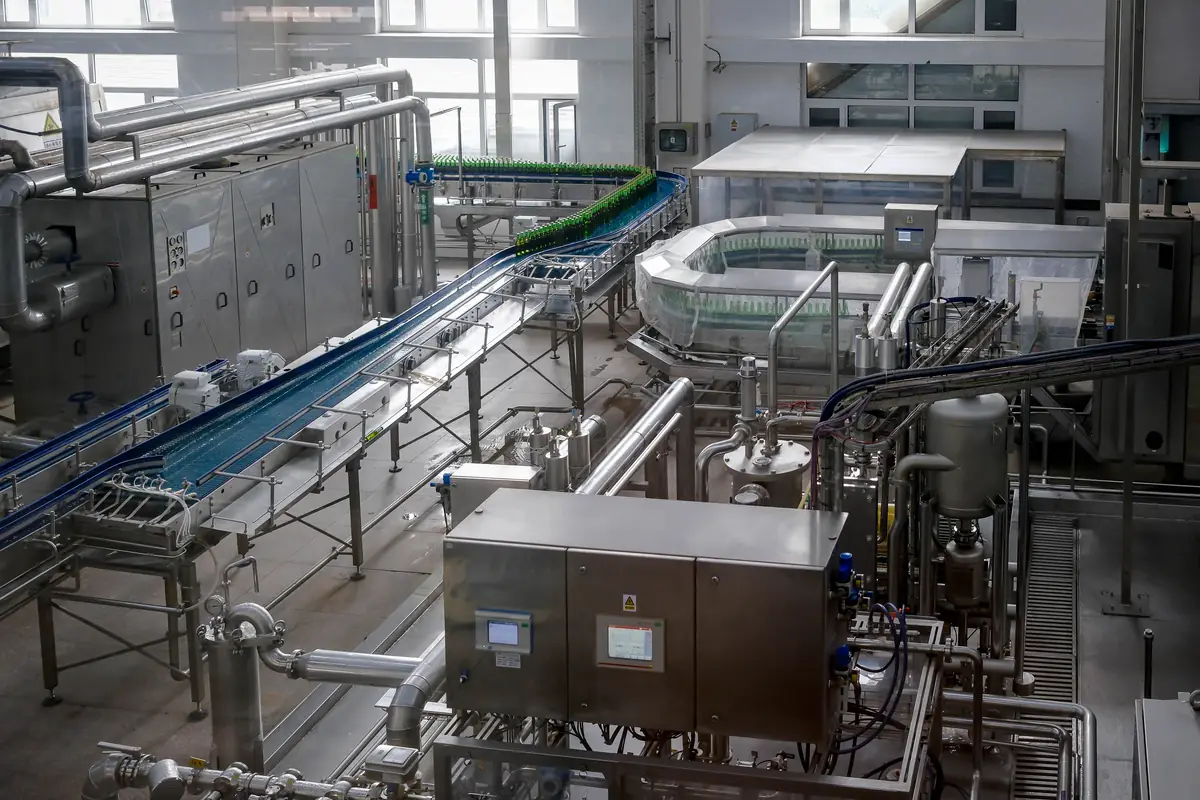 Stainless-steel processing equipment on a food production line