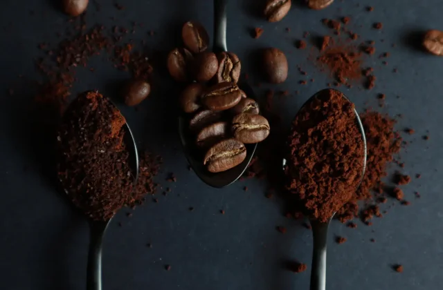 Spoonfuls of dark roasted date seed powder