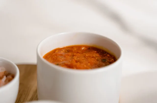 Harissa paste in a small cup